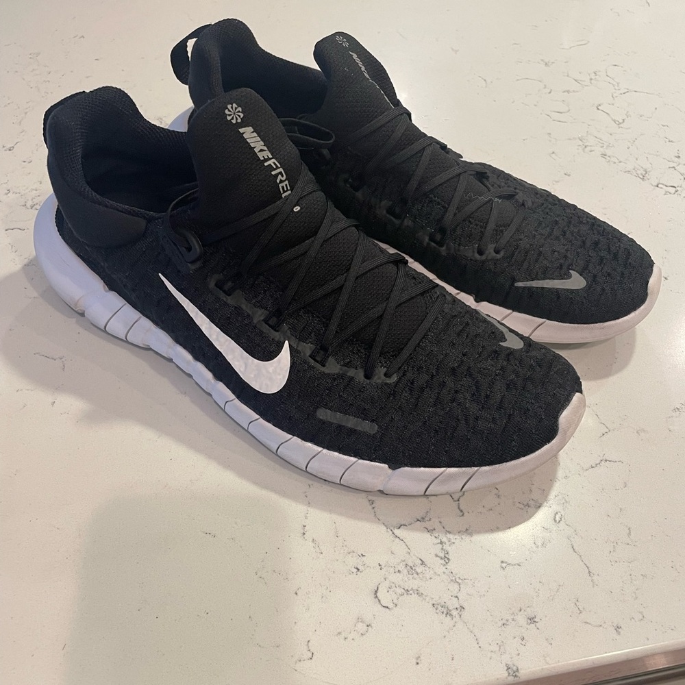 Men’s Nike Free 5.0. Black. In good used condition.